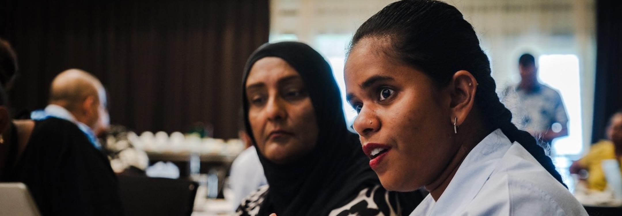 Woman participant talks at the Fiji national dialogue